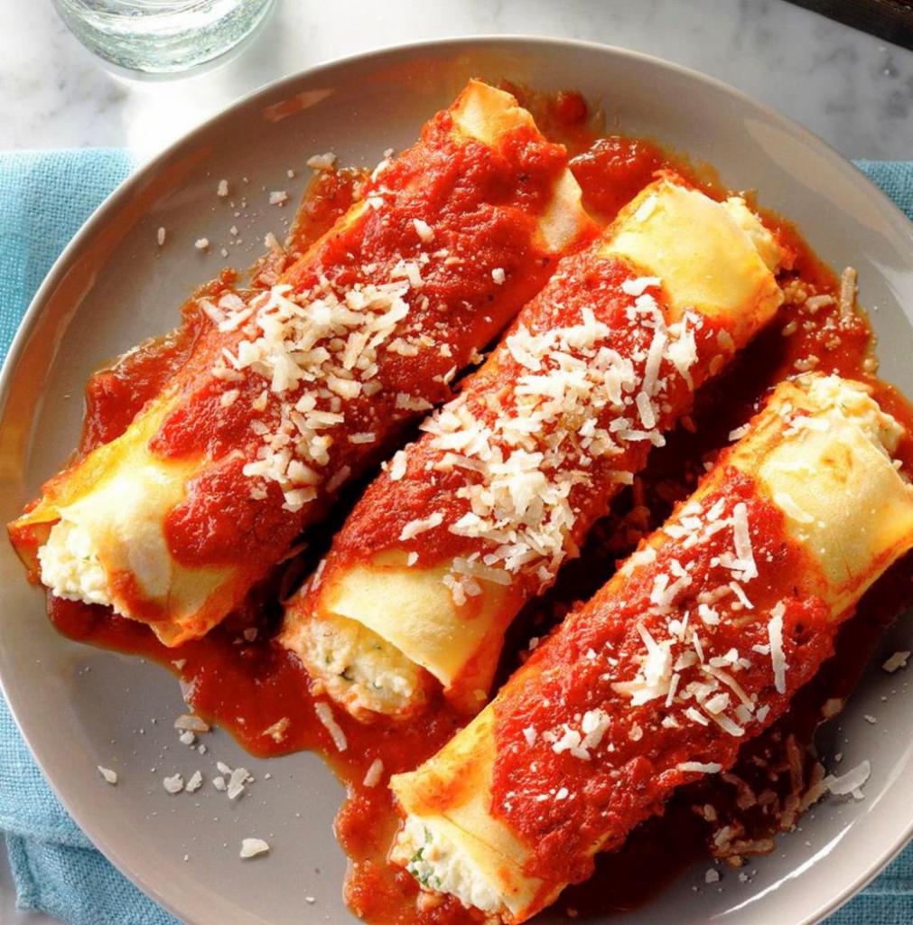 Manicotti · Served with salad, bread and butter and Romano cheese.