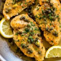 Piccata Entree · Capers, lemon sauce and garlic. Served with salad, bread and pasta.