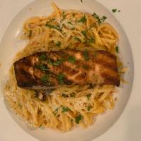 Salmon with Pasta · Served with choice of pasta, bread and butter and Romano cheese.