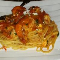 Seafood Pasta · Served with pink sauce. Served with choice of pasta, bread and butter and Romano cheese.