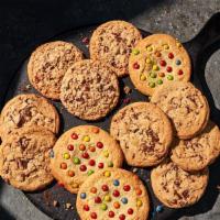 New One Dozen Mixed Cookies · 12 freshly baked cookies, made with 6 Chocolate Chipper Cookies, 3 Candy Cookies, and 3 Oatm...