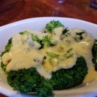 Broc 'n Cheese · Butter-steamed broccoli slathered with our house-made cheese fondue!
