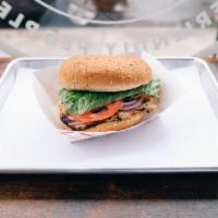 grilled chicken sandwich · includes lettuce, tomato and onion on a sesame seed bun