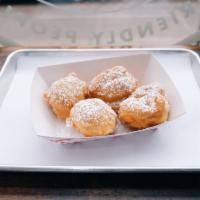 zeppoles · fried dough ball dusted with powdered sugar