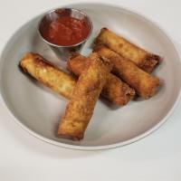 Pizza Egg Rolls (5) · Stuffed with pepperoni and mozzarella, served with a side of marinara