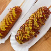 Hand Dipped Corn Dogs · 100% Beef sausage.
Deep fried coated with House made Honey Batter.