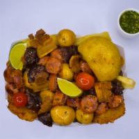 6. Picada ·   plantain, chorizo, blood sausage, pork rind,  , yellow  potato  pork rind, yuca and ribs. ...