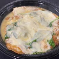 Chicken Florentine · Boneless chicken breast in a lemon butter and white wine sauce topped with fresh spinach and...