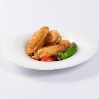 Yuzu Tebasaki (6 pieces) · Japanese fried chicken wings in yuzu and lemon sauce.