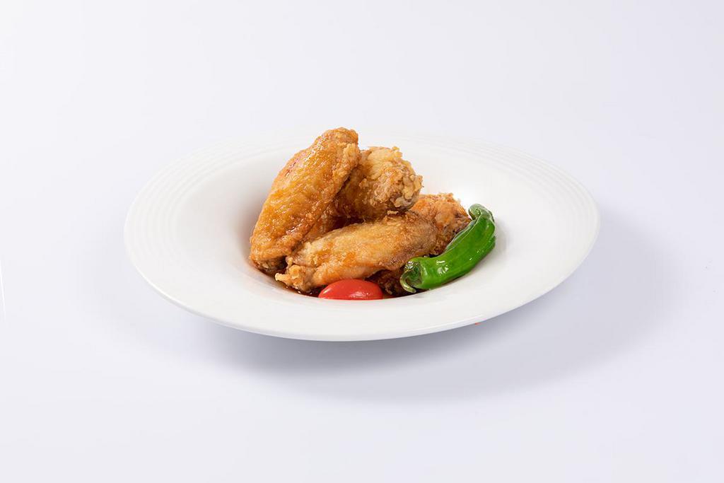 Yuzu Tebasaki (6 pieces) · Japanese fried chicken wings in yuzu and lemon sauce.