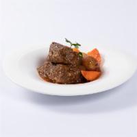 Short Ribs · Slow braised angus beef short ribs with our oki classic special BBQ sauce.