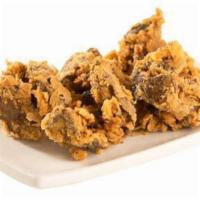 Chicken Livers · Hand-breaded and fried chicken livers.