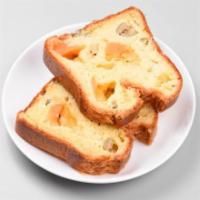 Olive & Cheddar Bread (slice) · Savory piece of olive and cheddar bread
