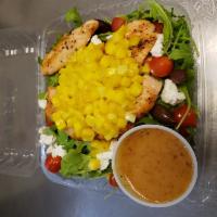 Bella Bella Salad · Grilled salmon, cherry tomatoes, goat cheese, diced mango citrus over baby arugula, Kalamata...