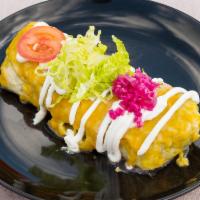 Burritos Locos · Same as house burritos topped with more Chile and choice of meat lettuce, sour cream, tomato...