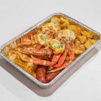 Big Kuz · A hearty-sized helping of our boiled to perfection seafood platter to include 2 krab cluster...