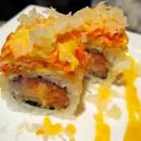 Dynamite Roll · Spicy tuna, spicy yellowtail inside, crunchy spicy crab meat on top.