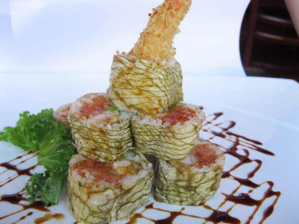 Tiger Roll · Shrimp tempura, spicy tuna and avocado wrapped with soy wrap.