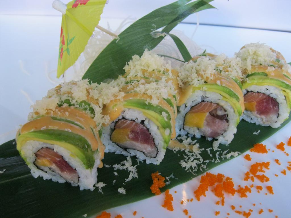 Godzilla Roll · Tuna, salmon, yellowtail and mango topped with avocado and spicy mayo tempura flakes.