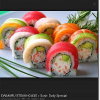 Rainbow Roll · Crab meat, avocado and cucumber inside topped with white fish, tuna, salmon and tobiko.