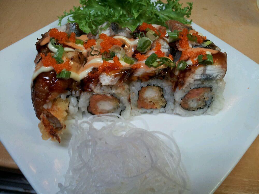 SP3. Black Dragon Roll · Eel, eel sauce, spicy mayo, mayo with shrimp tempura and spicy tuna.