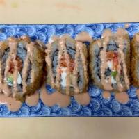 SP11. Queen Roll · Spicy crab meat, avocado and cream cheese. Topped with spicy mayo. Deep fried.