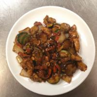 Kung Pao with Chicken · Spicy dish with carrots, onions, zucchini, red chillies, water chestnuts and peanuts.