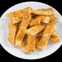 Garlic Breadsticks · With your choice of dip.