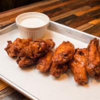 Chicken Wings · 1LB. of Chicken Wings Deep Fried and Made with Your Choice of Sauce. Served with Ranch or Bl...
