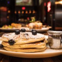 Stacked Pancakes  · 4 Buttermilk Pancakes served with Your Choice of Topping, Butter, Powdered Sugar, and Maple ...