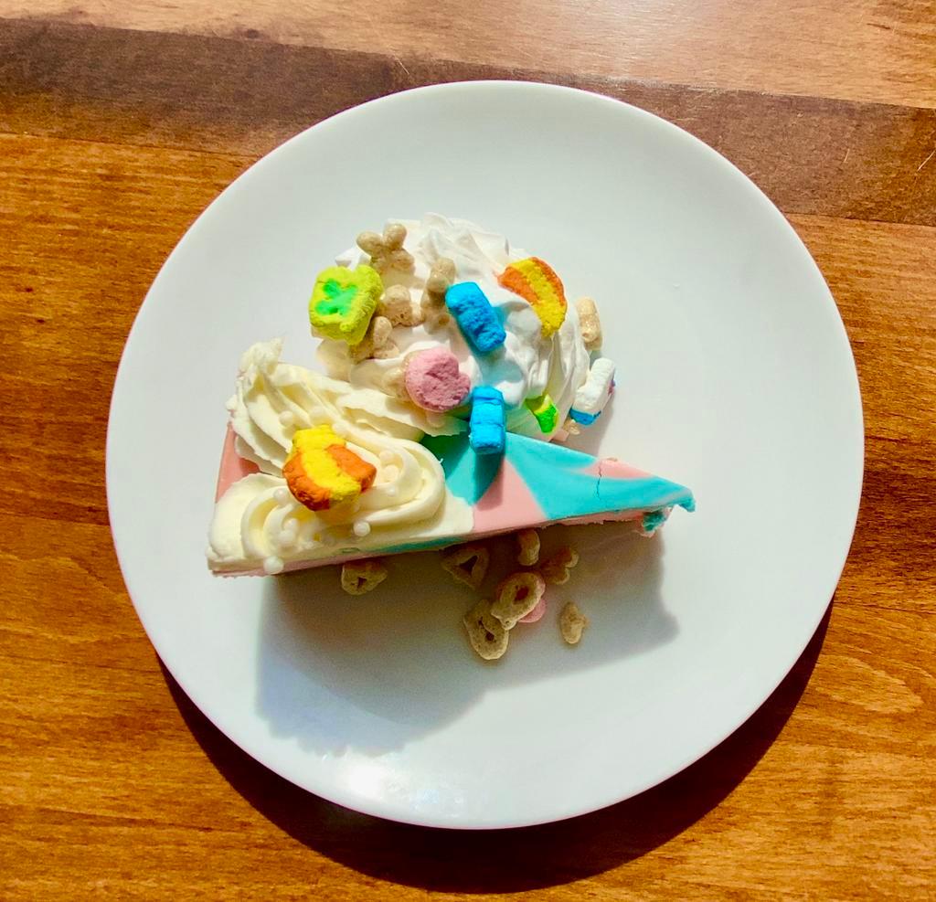 Lucky Charms Cheesecake  · Cotton Candy Swirl Cheesecake Topped Lucky Charms Cereal and Whipped Cream.