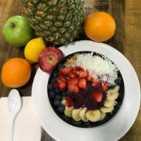 Original Acai Bowl · Acai berry blended with banana, topped with granola, banana, strawberry, coconut flakes and ...