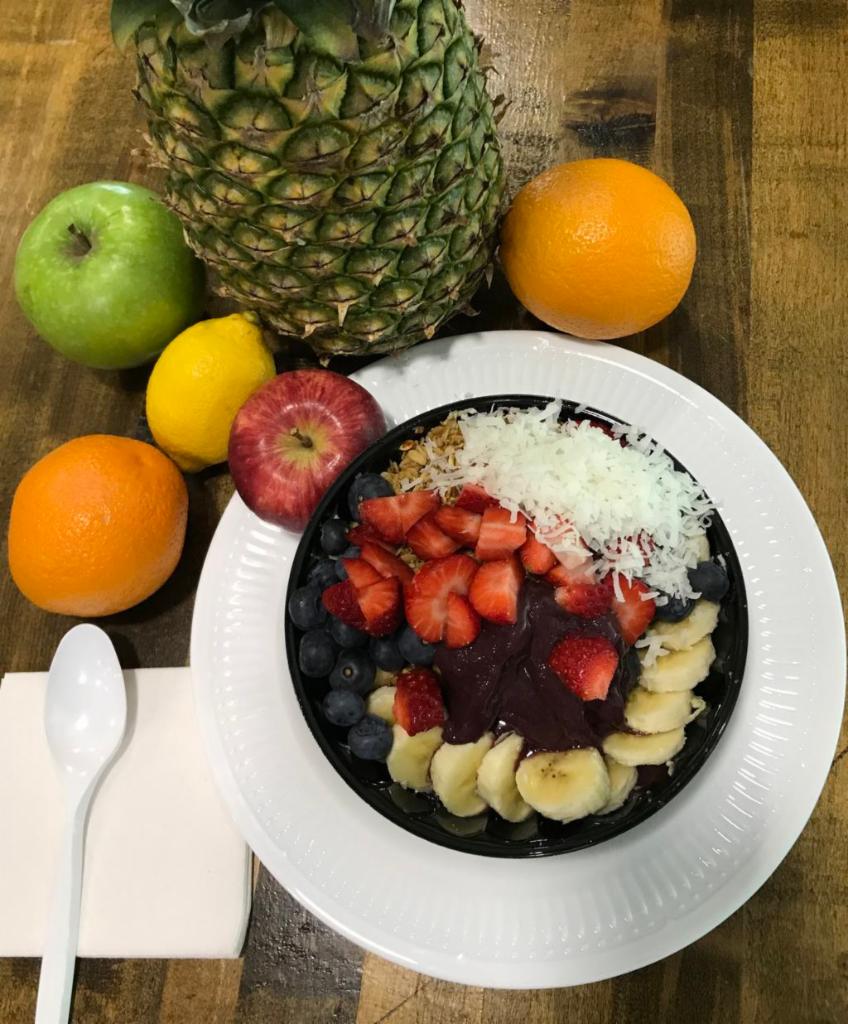 Original Acai Bowl · Acai berry blended with banana, topped with granola, banana, strawberry, coconut flakes and honey 32 Oz Bowl.