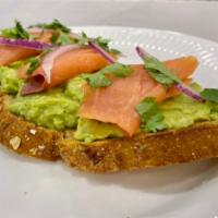 Salmon Avocado Toast · Artisan Bread toast, smoked salmon, smashed avocado, red onion, pepper, cilantro
