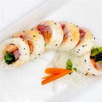 SYT Roll · Salmon, Yellow tail, Tuna with avocado, cucumber, jalapeno, gobo wrapped in soy paper with R...