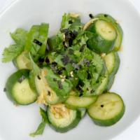 Cucumber Salad  · Cucumber, cilantro, rayu, and shoyu. 
