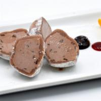 Mochi Ice Cream  · 2 pieces serving. Choose a flavor from green tea, chocolate, or strawberry.