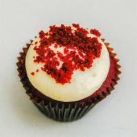 Red Velvet Cupcake · Famous red velvet cake and signature cream cheese frosting with pecan or cake crumbles.

