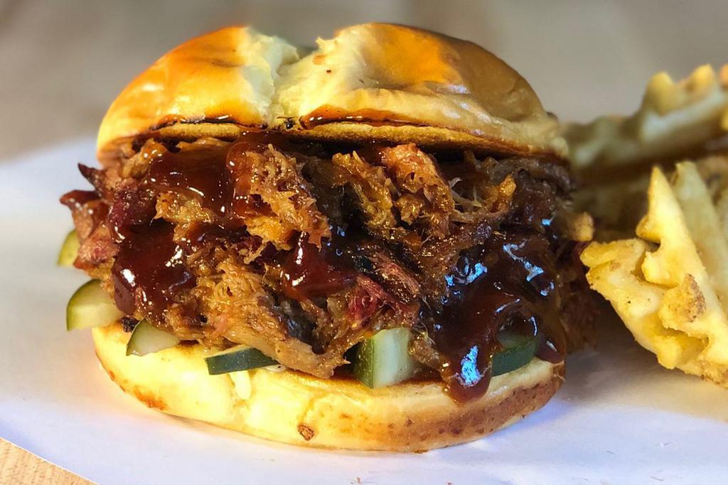 Pulled Pork Stack · Hardwood smoked pulled pork with your choice of BBQ.