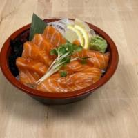 Salmon Bowl * · Salmon and ikura on top of sushi rice. May contain raw or undercooked ingredients. 
