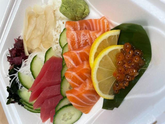 Tuna and Salmon Bowl *  · Tuna and salmon on top of sushi rice. May contain raw or undercooked ingredients. 