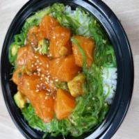 Salmon Poke Bowl *  · Salmon poke on top of sushi rice. May contain raw or undercooked ingredients. 