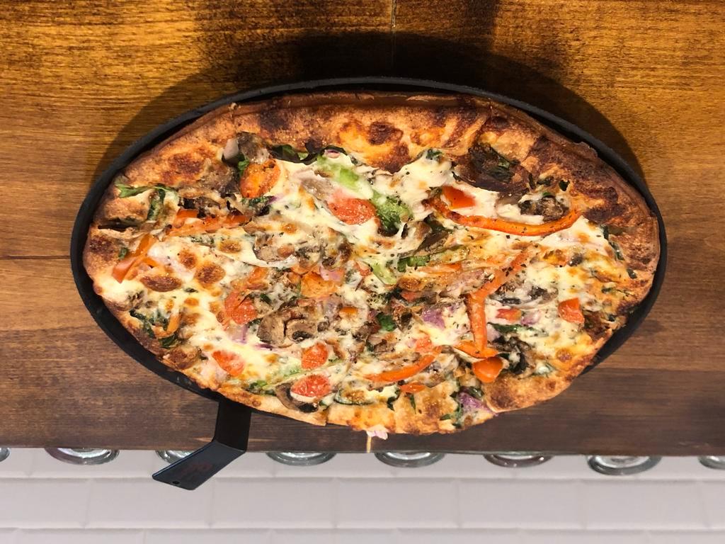 Fit and Delicious Pizza · Thin crust with light pizza sauce, spinach, fresh mushrooms, tomatoes, red and green peppers, red onions, mozzarella, fresh garlic and garlic sprinkles.