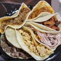 The Rumble · 6 tacos, one of each meat, NO substitutions.  1 x Asada, 1 x Birria, 1 x Chicken, 1 x Al Pas...