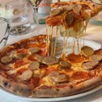 Pepperoni and Sausage Pizza · Tomato sauce, mozzarella cheese, pepperoni and sausage.