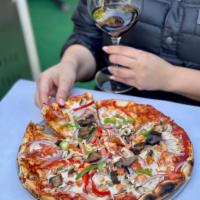 Vegetarian Pizza · Mushrooms, eggplant, zucchini fresh tomatoes, onions, bell pepper, tomato sauce and mozzarel...