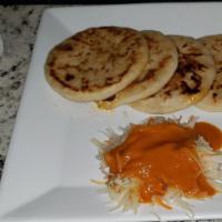 Pupusas · Thick tortilla stuffed with cheese and an option of pork, loroco, frijoles. Served with chop...