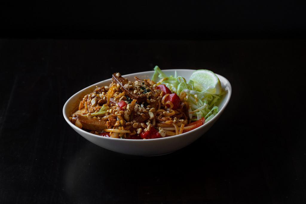 Burmese Pad Thai Noodles · Rice noodles mixed with tofu, red bell pepper, onions, scallion, bean sprouts, egg, paprika, turmeric, peanuts, cabbage, and fish sauce.
Gluten Free