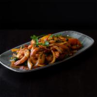 Shrimp Kebat · Marinated shrimp stir-fried with onions, tomato, mint, cilantro, jalapeño, turmeric, tamarin...