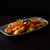 Sweet 'n Sour Shrimp · Lightly battered and fried shrimp, pineapple, bell pepper mix, and tomato in a sweet 'n sour...